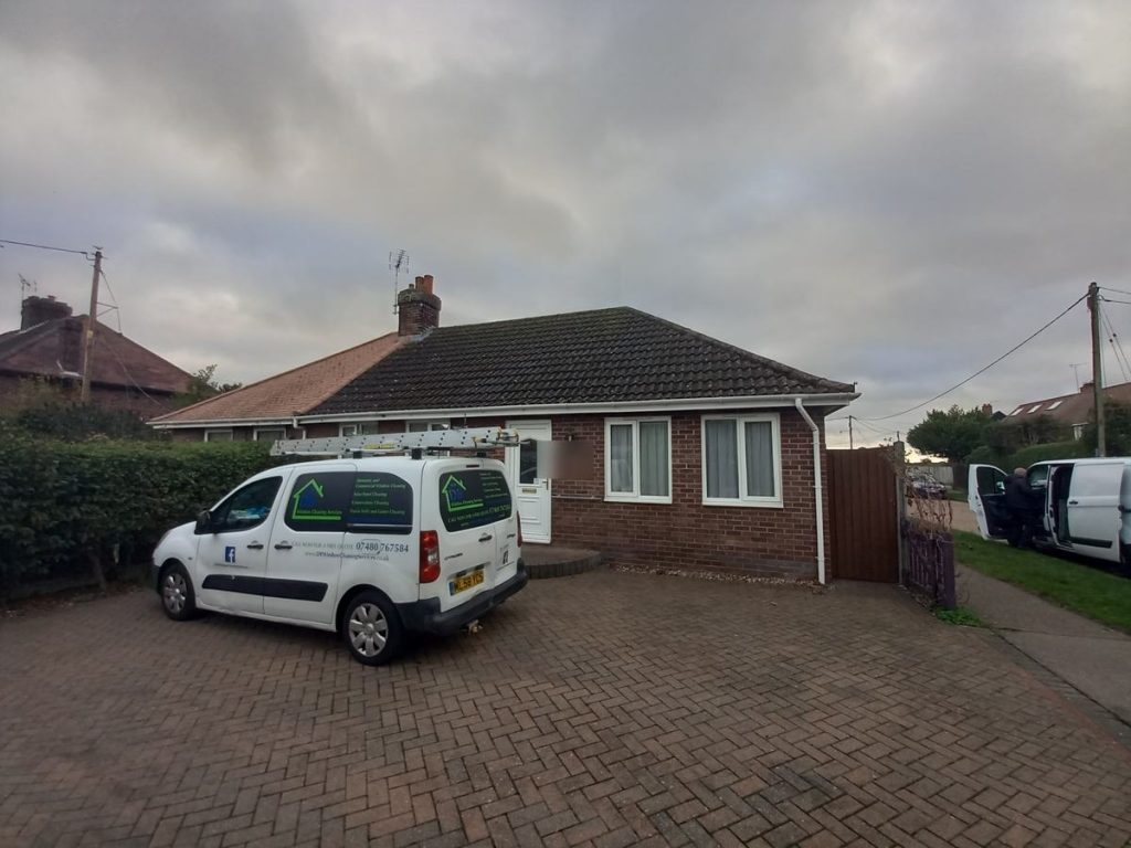 DB Window Cleaning Services van on a driveway in Holland-on-Sea